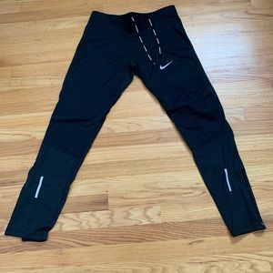 Nike Shield tights. Never worn. New condition.